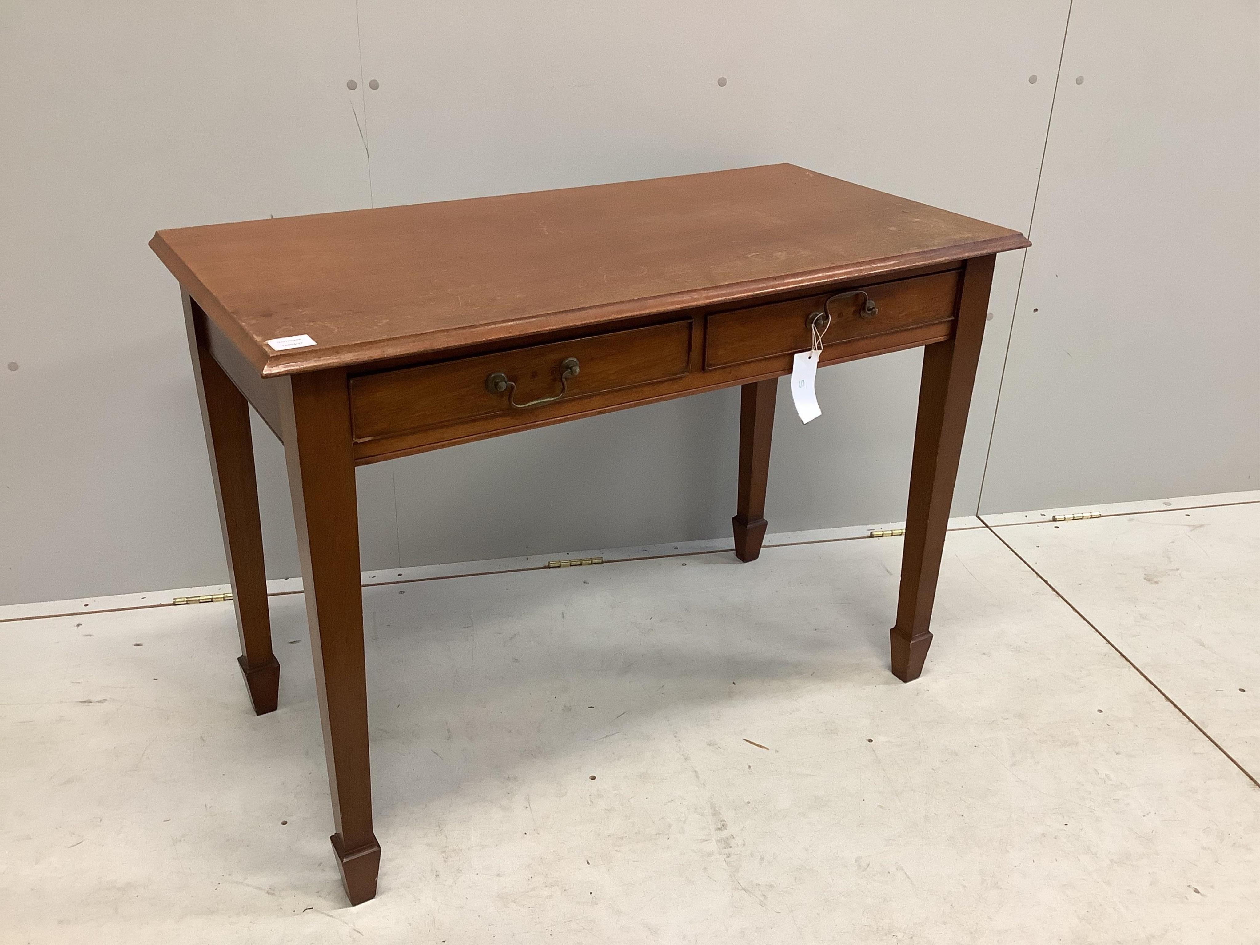 A George III style mahogany side table with two frieze drawers with swan neck brass handles and square tapered legs with spade feet, width 105cm, depth 52cm, height 76cm. Condition - poor to fair